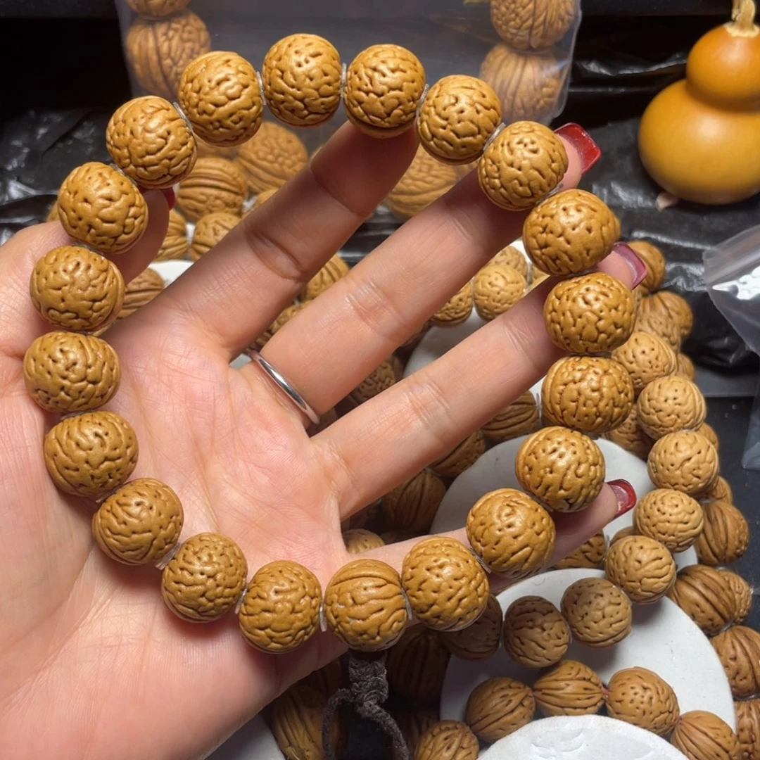 诠***哥桃核吊坠桃核手串17+金丹