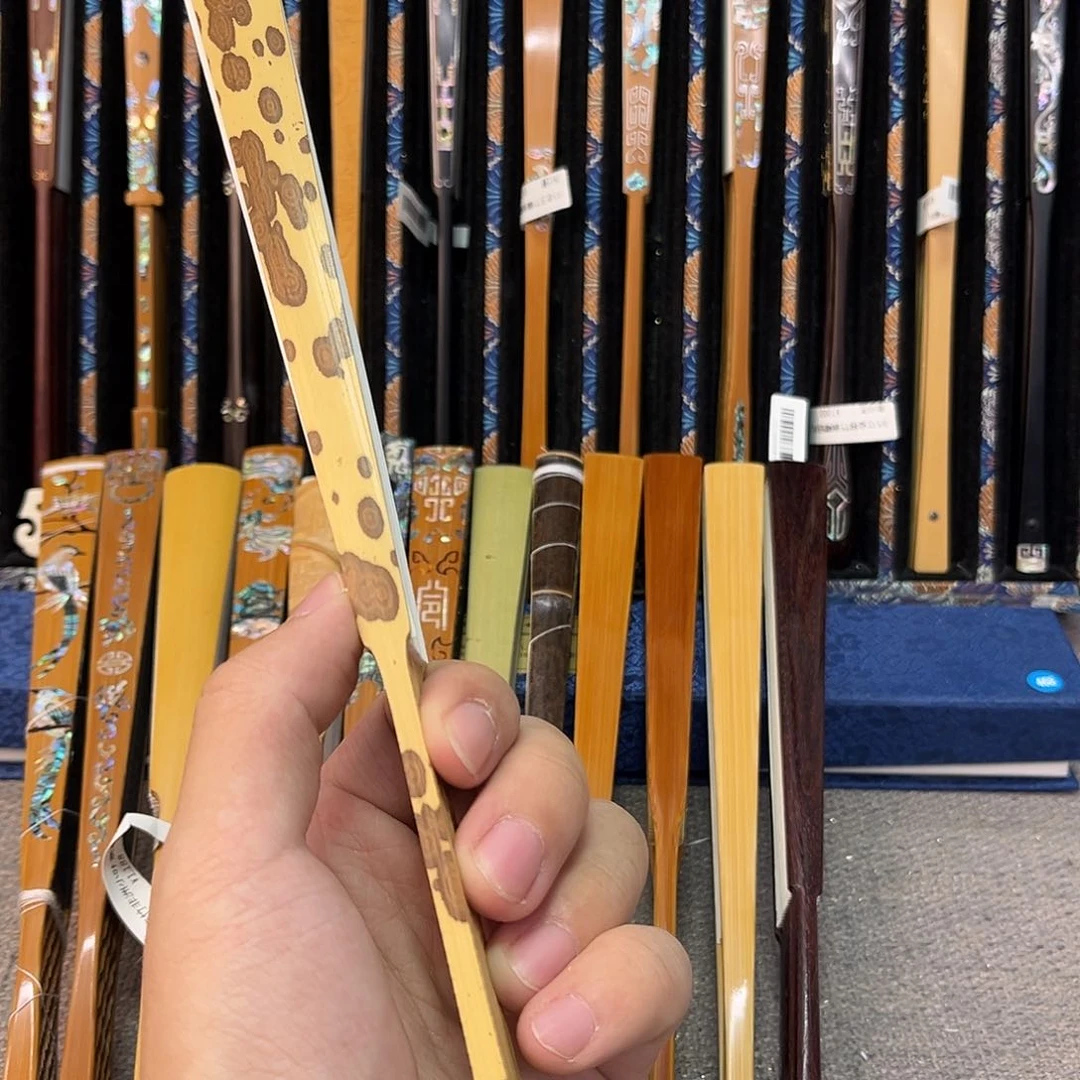 扇子周**纸纯手工制作的