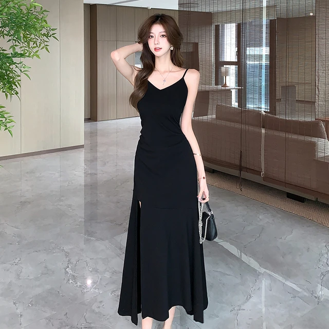 黑色吊带连衣裙女春秋季2025新款气质百网红洋气炸街女装知性风衣