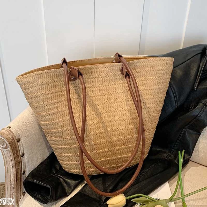 草编包包女夏天2025新款田园风编织单肩包海边度假通勤托特水桶包