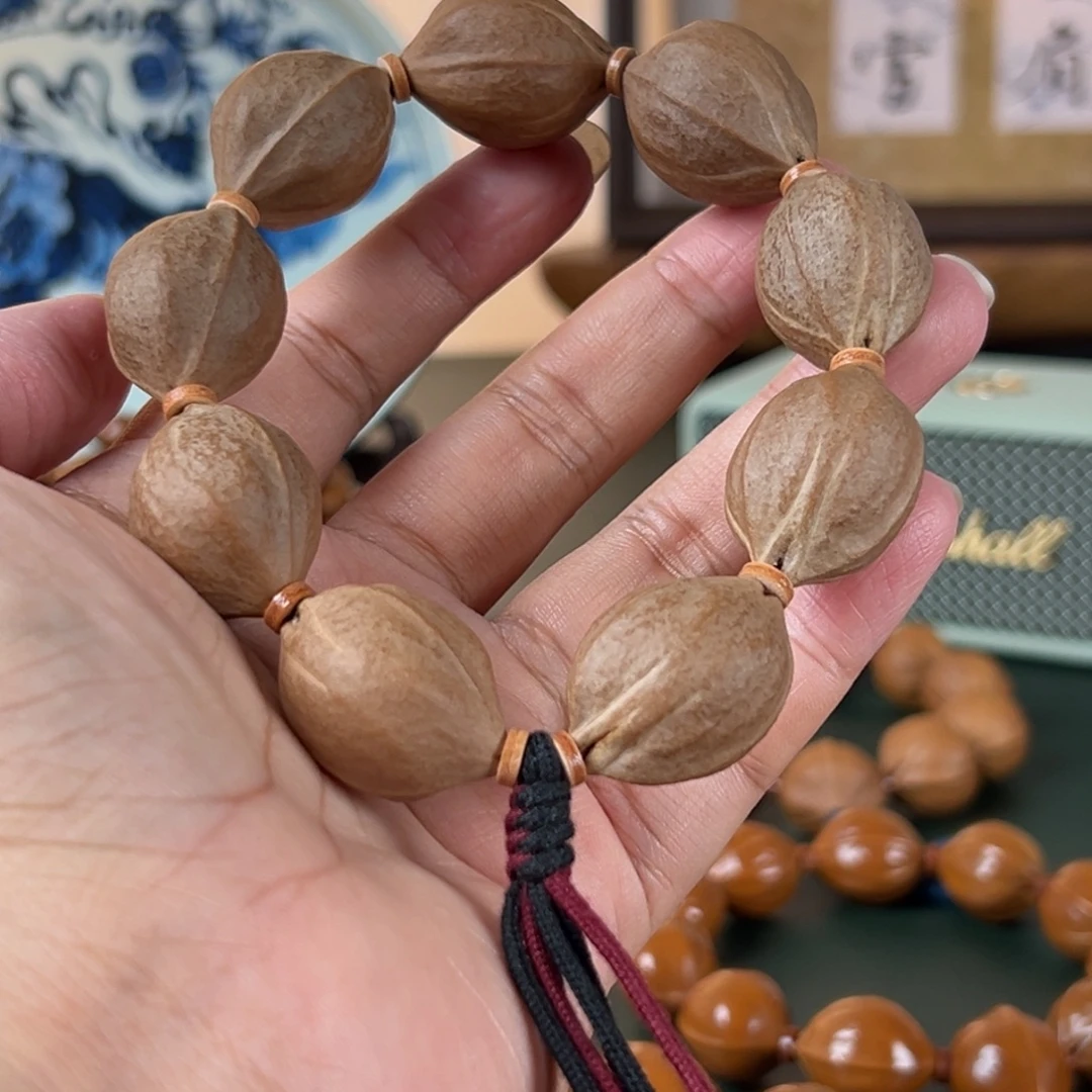 芳***华橄榄核手串21×28鲨鱼背