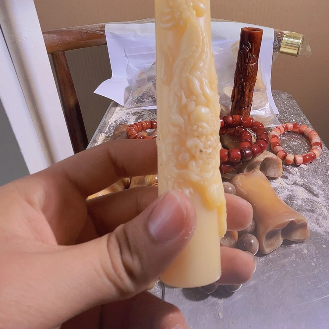 钛合金yy驼骨雕刻麒麟