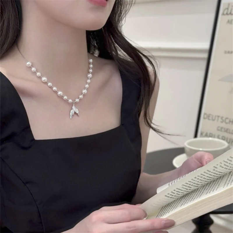 钛钢项链 夏季新款鱼尾珍珠流苏项链时尚轻奢高级感锁骨链百搭