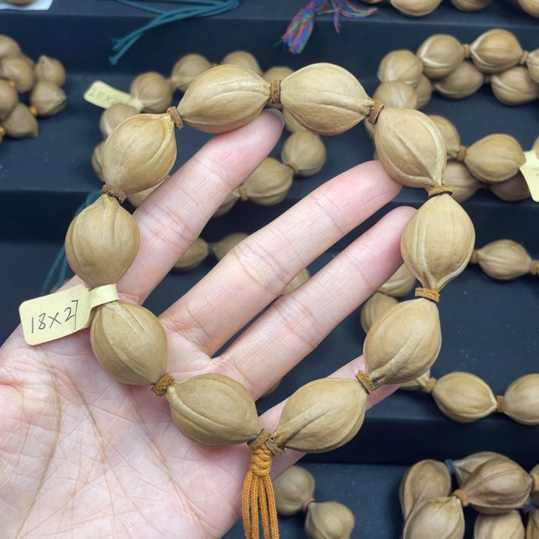 001橄榄核三花18*27