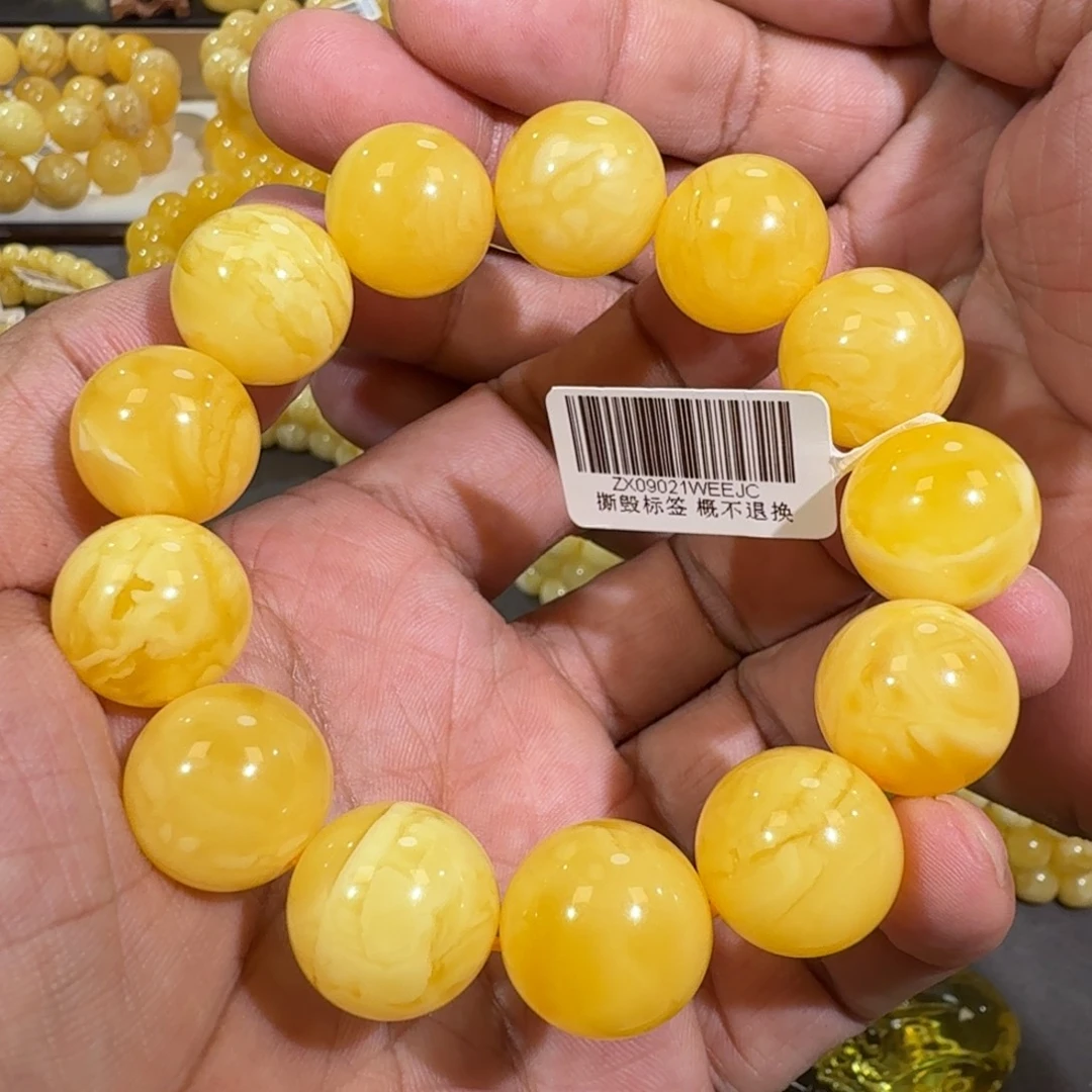 琥珀未镶嵌珠宝奇石17m+焦皮橘黄花蜡串37.1克