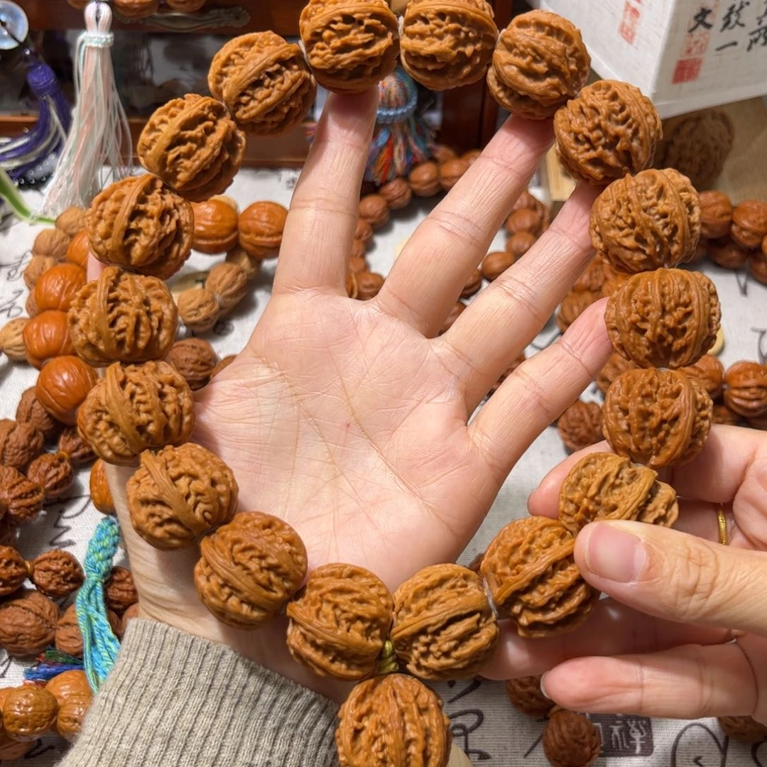 ***ﾠ桃核吊坠莲花八棱