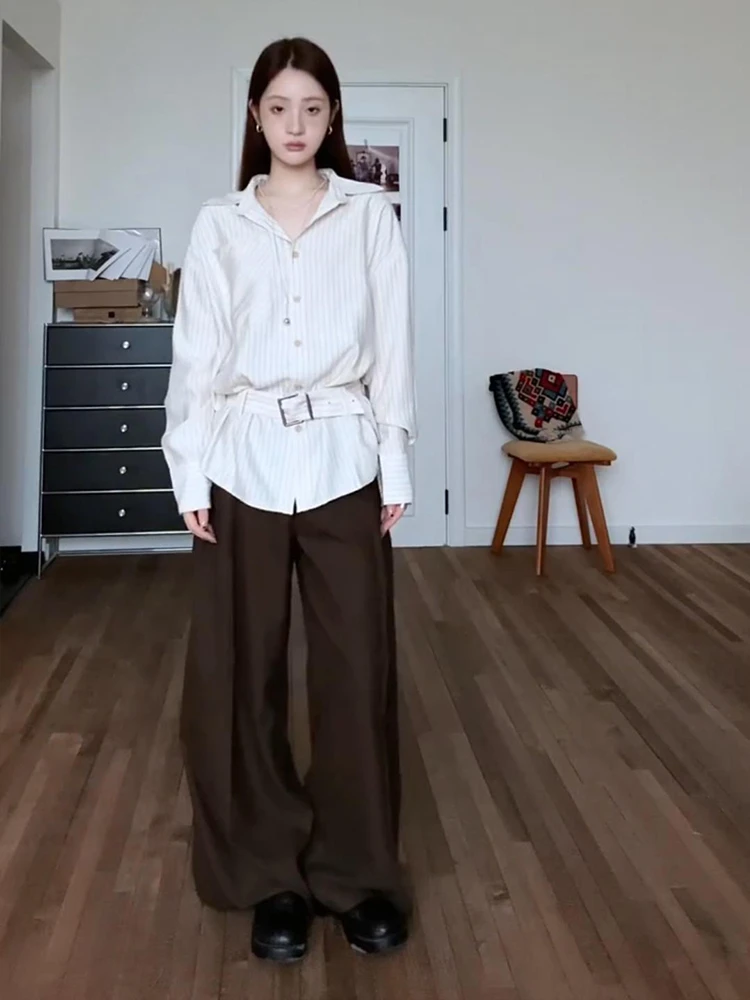 今年流行的设计感小众长袖条纹衬衫女初秋天巨好看的绑带质感上衣