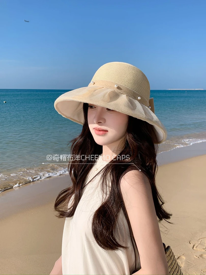 拉菲草拼接帽子女春夏UV防紫外线渔夫帽可折叠大沿盆帽珍珠蝴蝶结