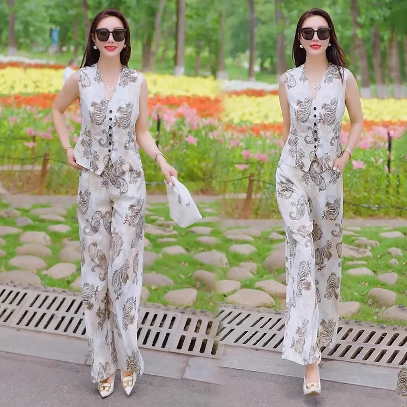 时尚洋气套装女2025夏季新款时髦显瘦设计感提花上衣阔腿裤两件套