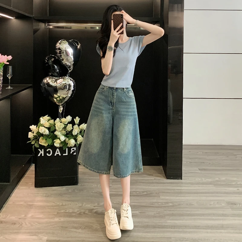 设计感小众时尚运动休闲套装女夏新款圆领背镂空短袖牛仔裤两件套