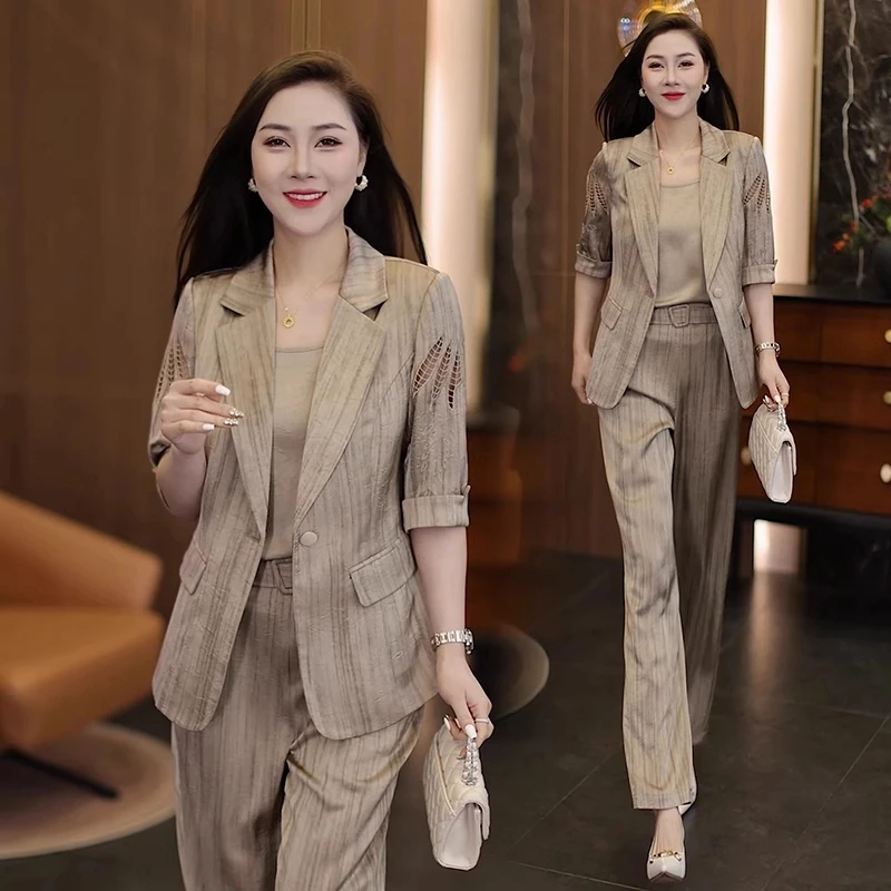 时尚高级感西装套装女2025春夏新款洋气西服外套吊带阔腿裤三件套