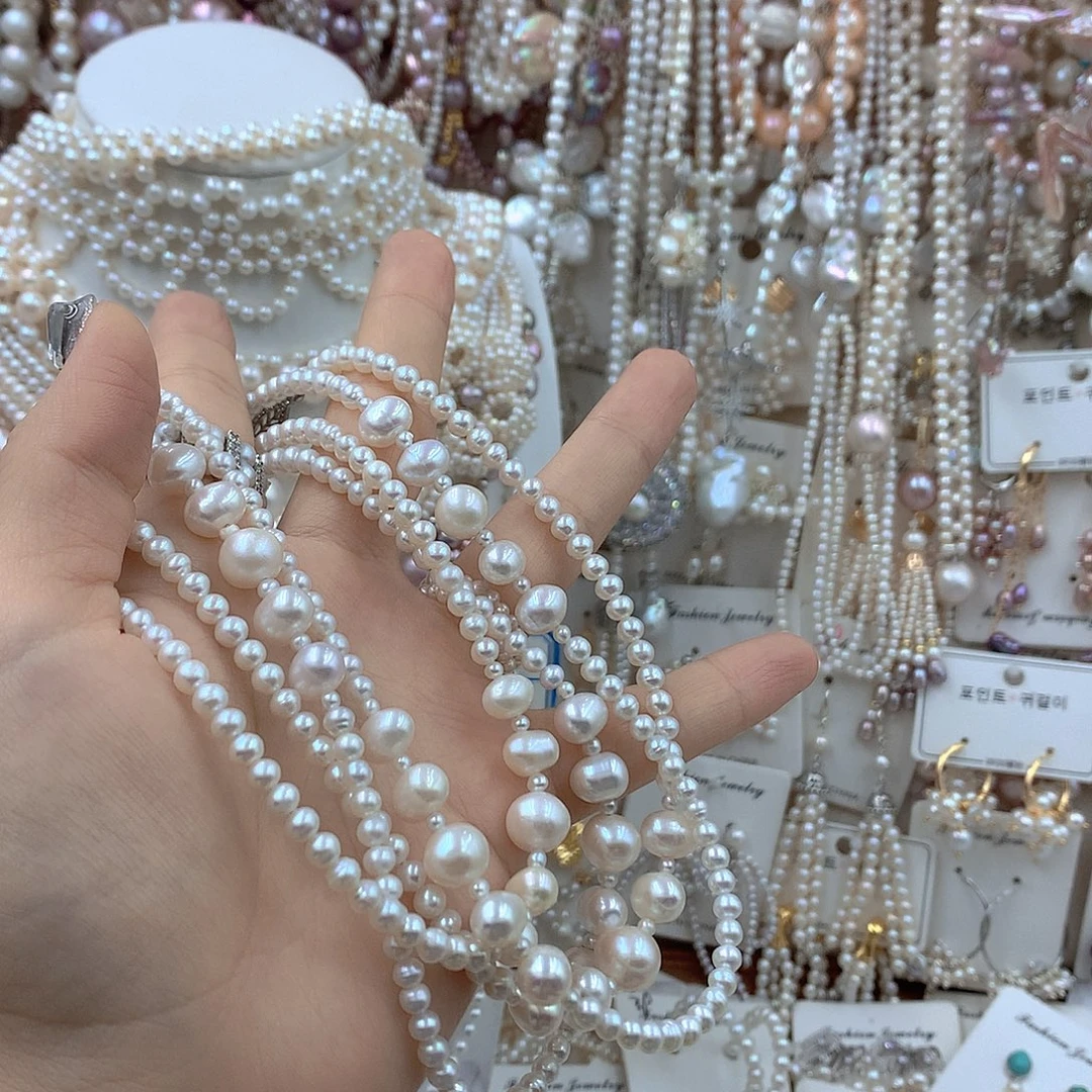 @***亿淡水珍珠银S925镶嵌耳饰