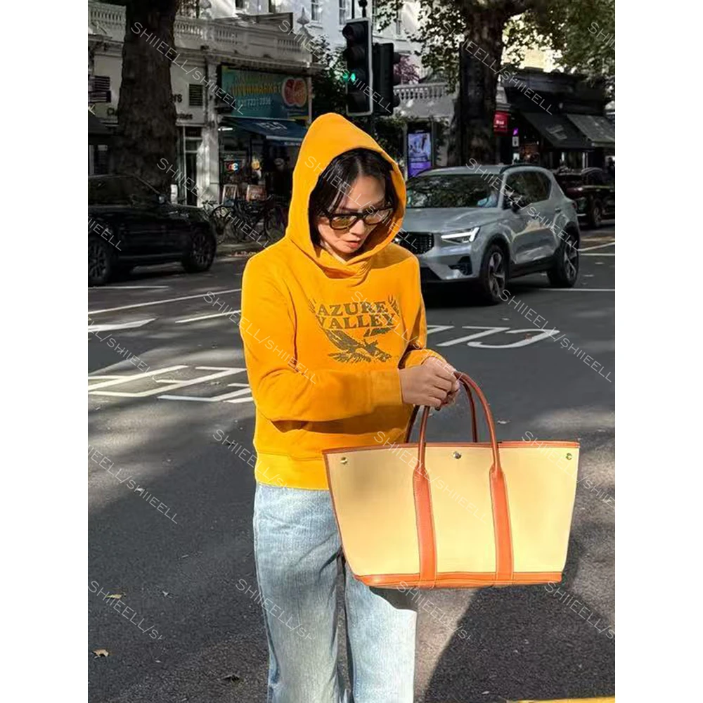 SHIIEELL【秋日拥抱】复古棉感短款姜黄撞色字母印花连帽卫衣W9117