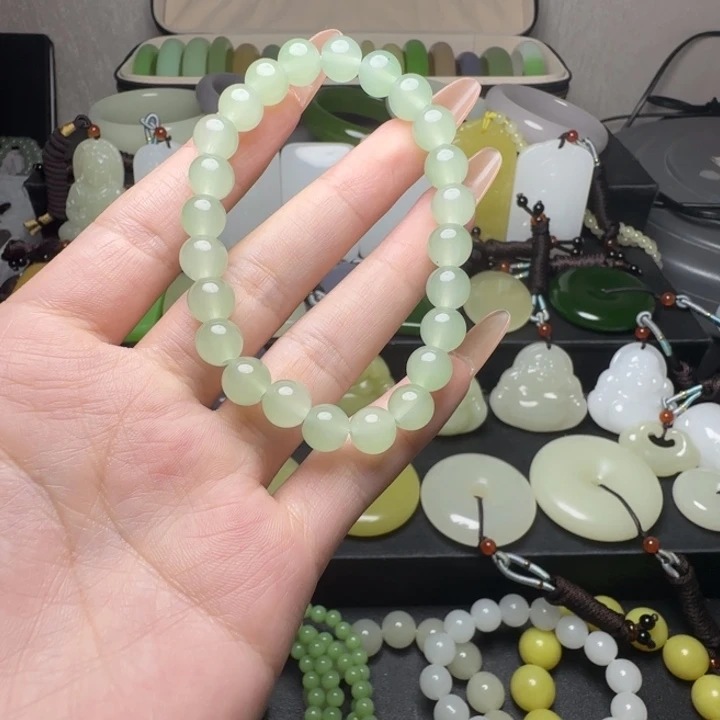 新疆老料晴水圆珠手串