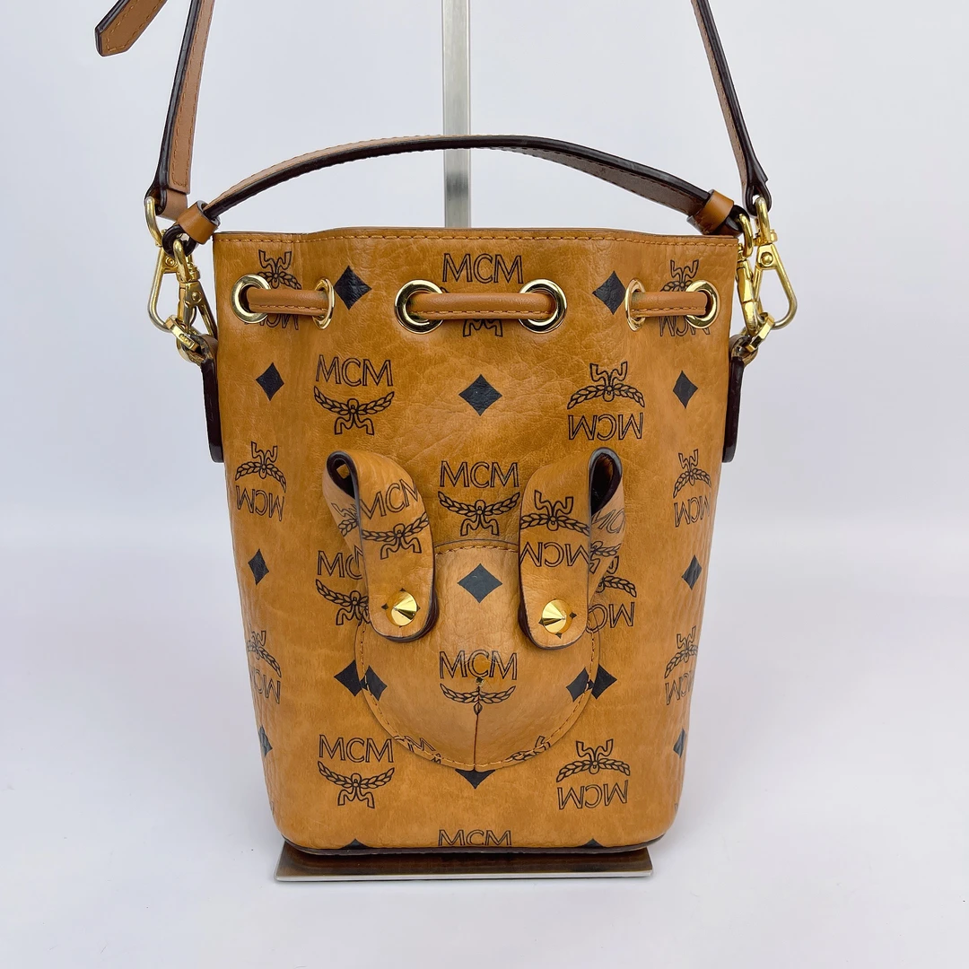 95新 MCM MCM干邑色老花水桶单肩包底长13 M247