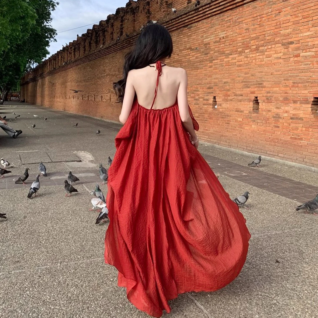 法式红色挂脖吊带连衣裙女夏季2025新款海边度假绝美露背长裙4092