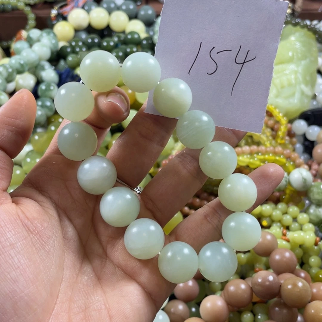 ****娥未镶嵌蛇纹石玉手串