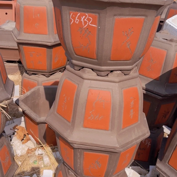 红陶口径56高32…………………………