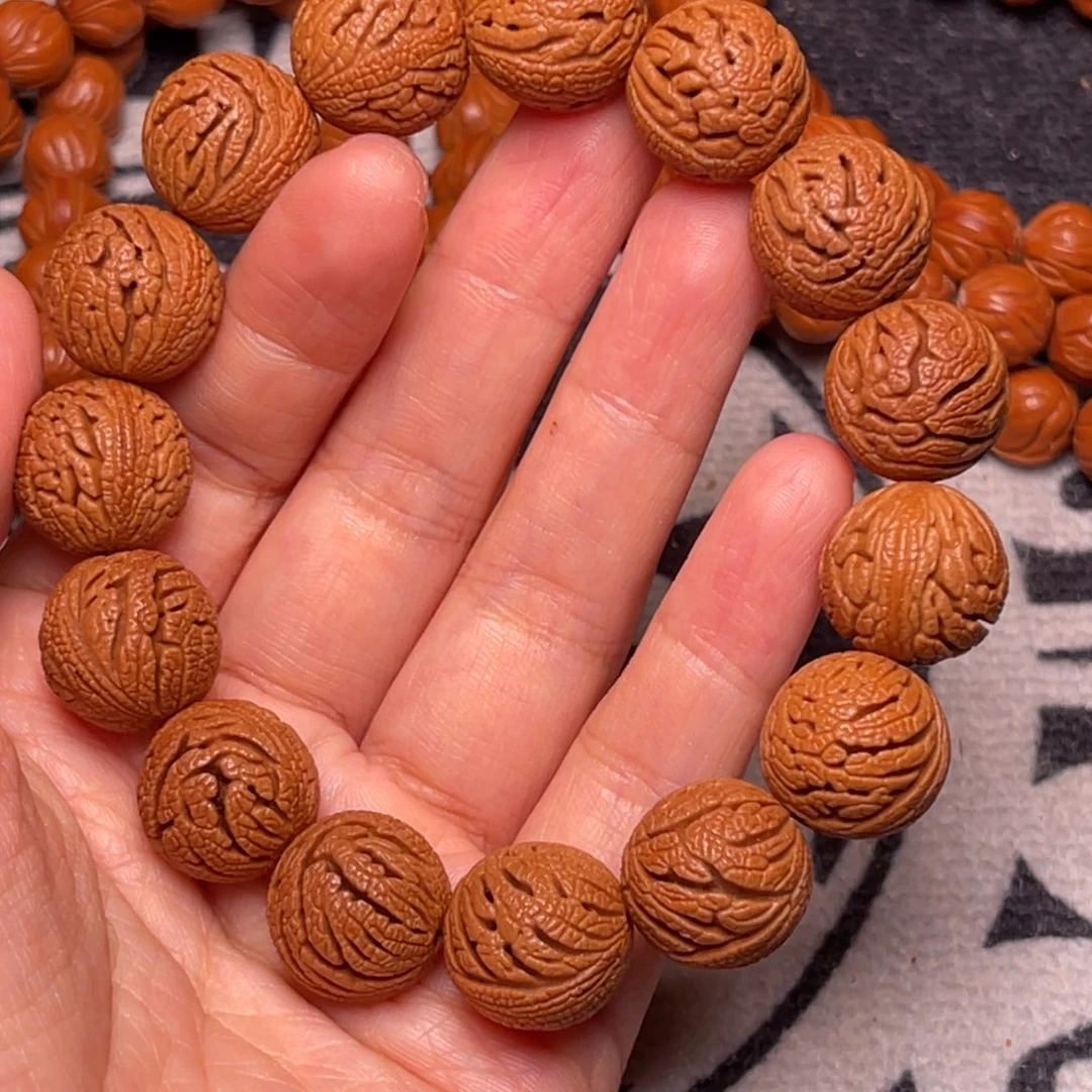 桃核手串龙纹绣球16