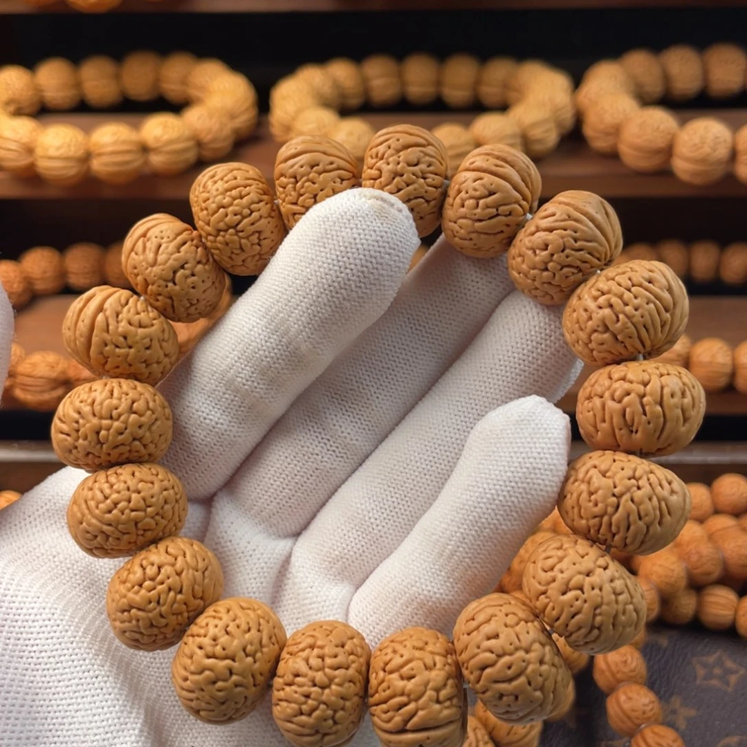 万***春吊坠桃核矮白月光