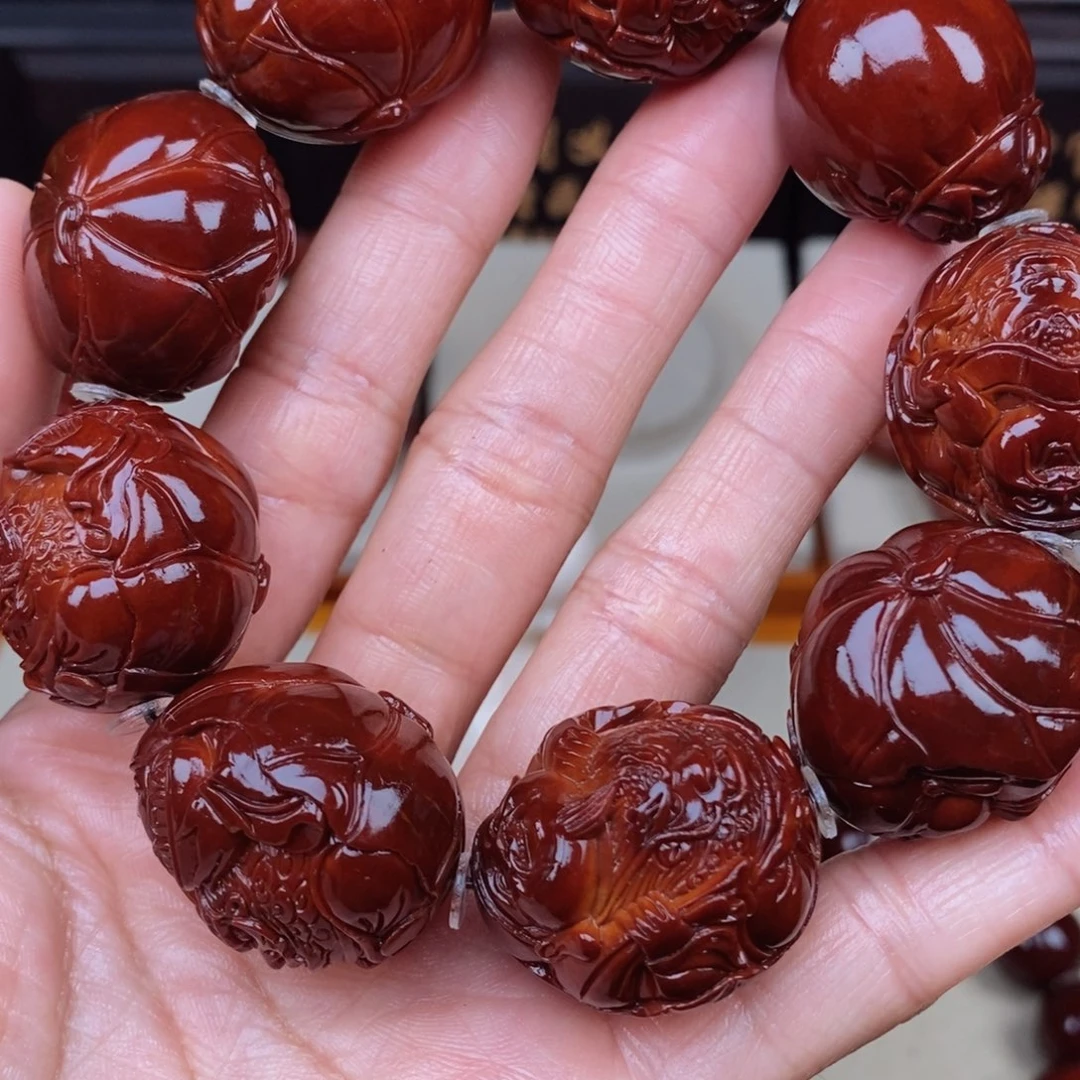 .***️吊坠橄榄核荷叶龙财神