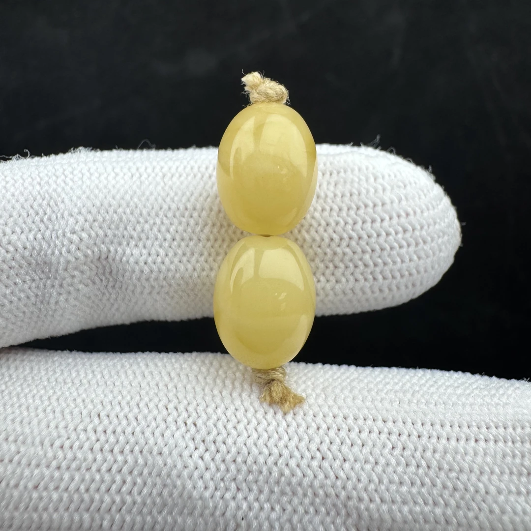 K2635天然原矿蜜蜡 对珠9.2mm支持鉴定 假一罚十