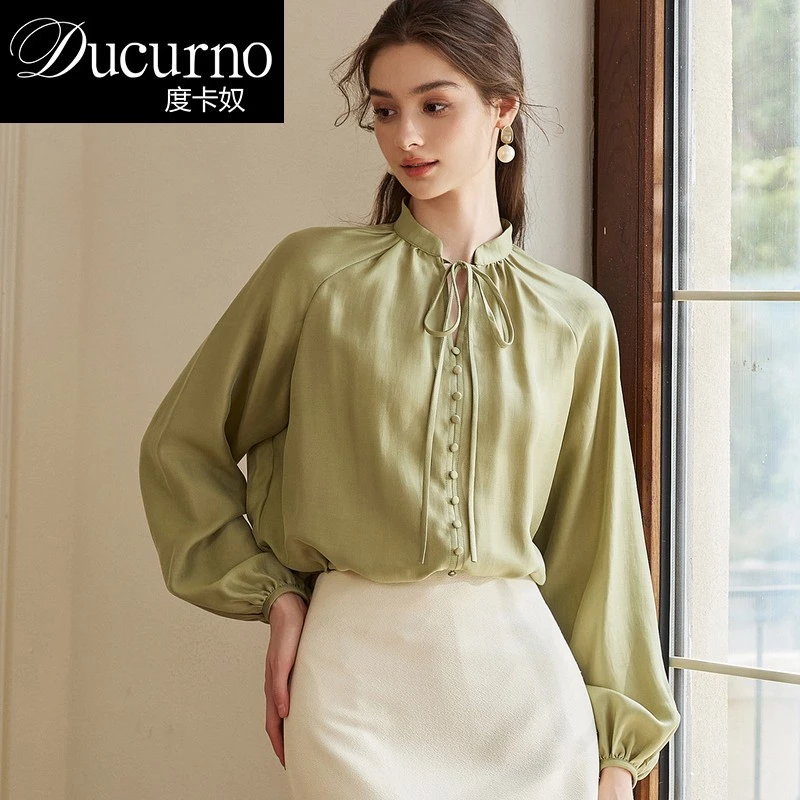 气质小众绿色长袖衬衫女士2025早秋季新款法式通勤宽松灯笼袖上衣