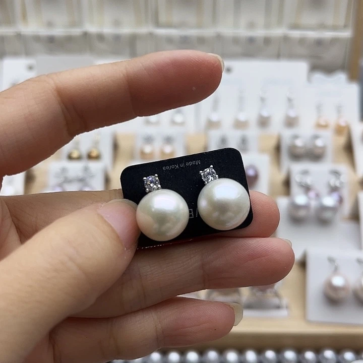 银S925镶嵌耳饰淡水珍珠12.2有纹理