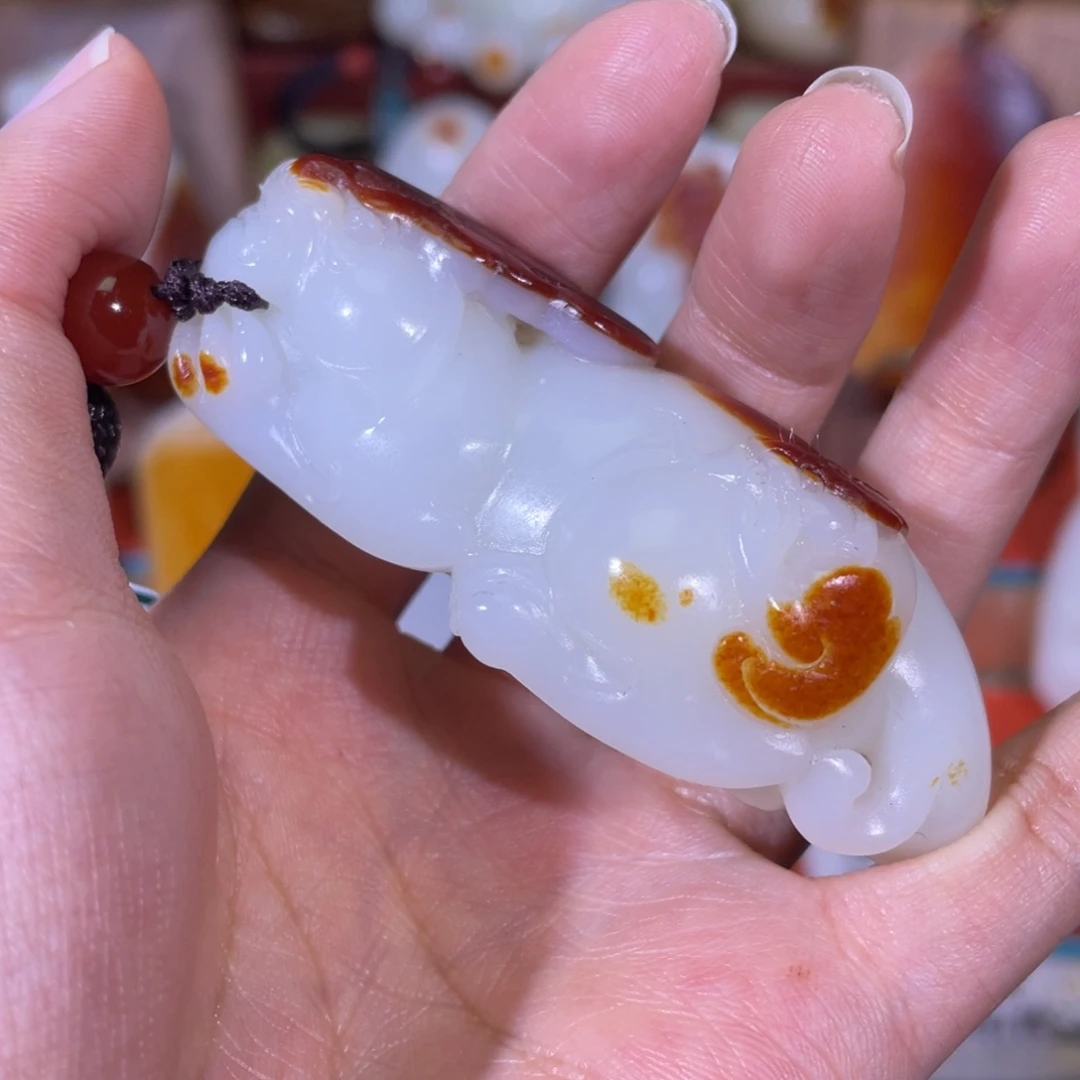 墨***。和田玉未镶嵌把件