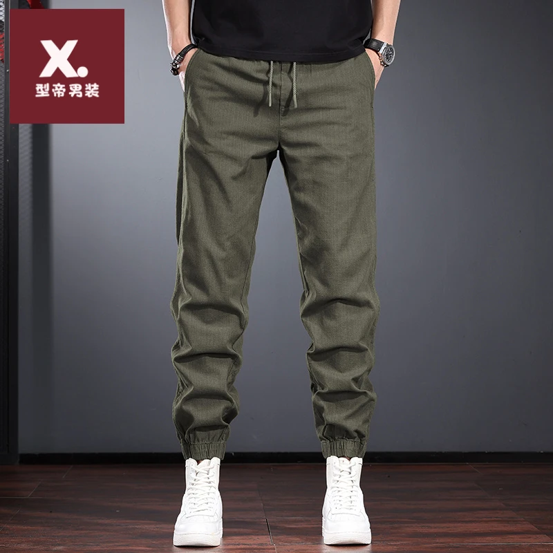 军绿色仿麻休闲裤男2025新款早秋宽松束脚哈伦裤纯棉百搭透气男裤