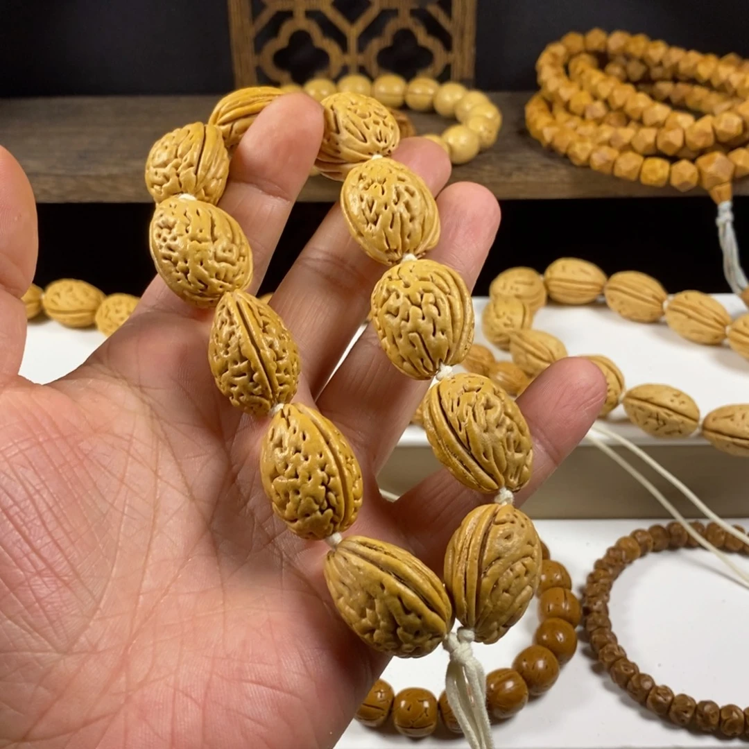 隔***某吊坠桃核沈阳钱袋子大高炮