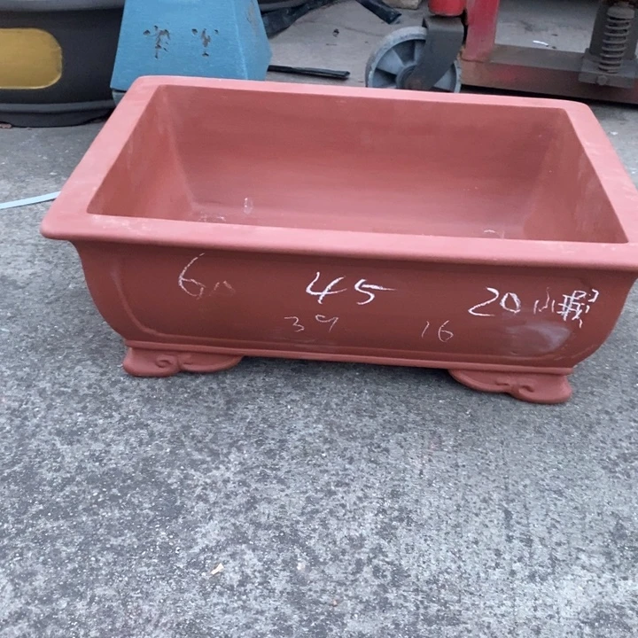 紫砂花盆只顾吃瓜就