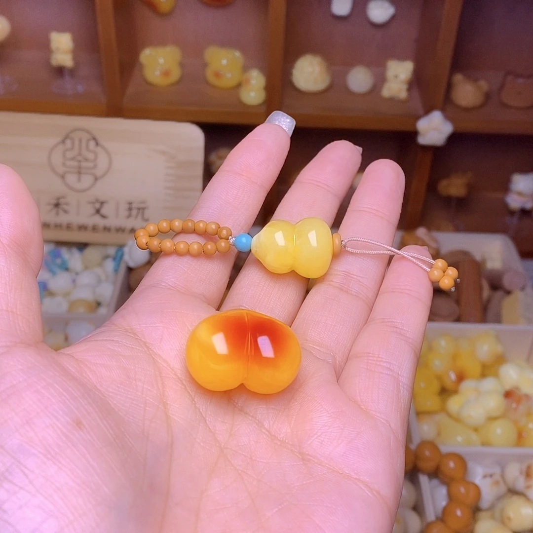 尔***尔吊坠猴头核桃爱心葫芦提溜