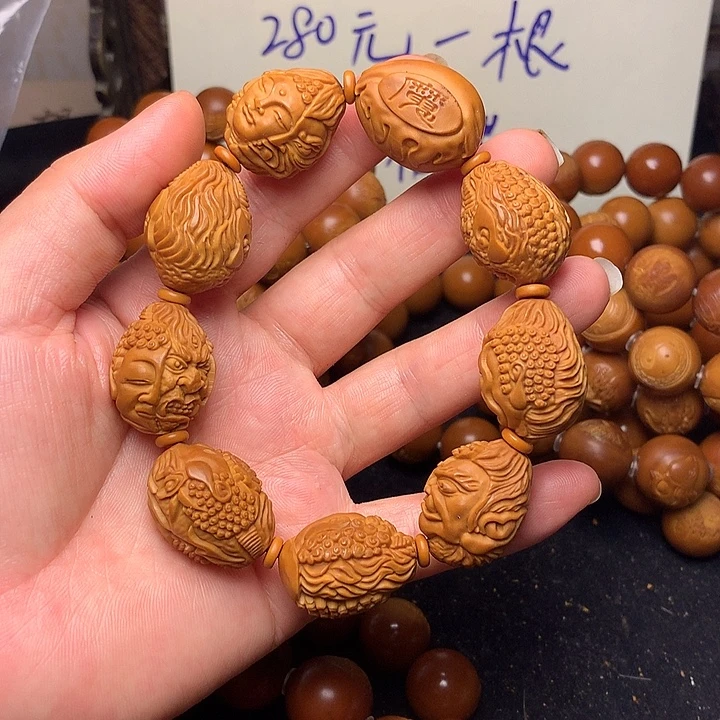 橄榄核雕刻手串一念