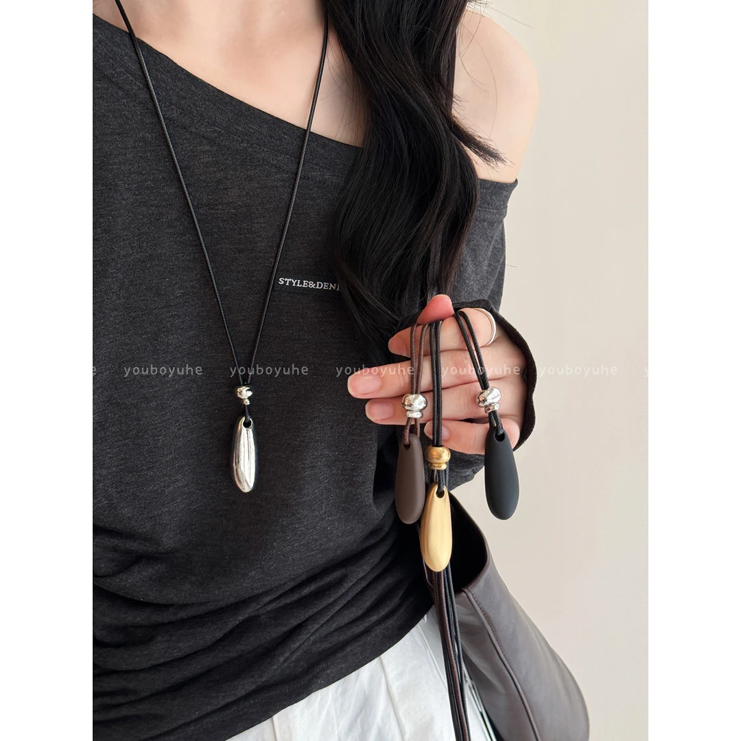 铜皮质项链 法式水滴吊坠项链女秋冬高级感长款毛衣链小众配饰品