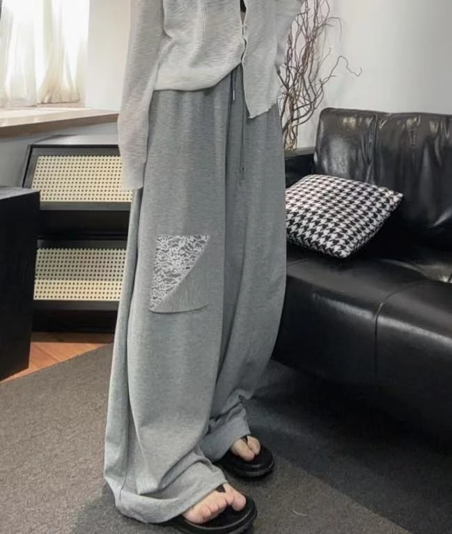 SHUANG洲：定制款大版破洞拼蕾丝卫裤