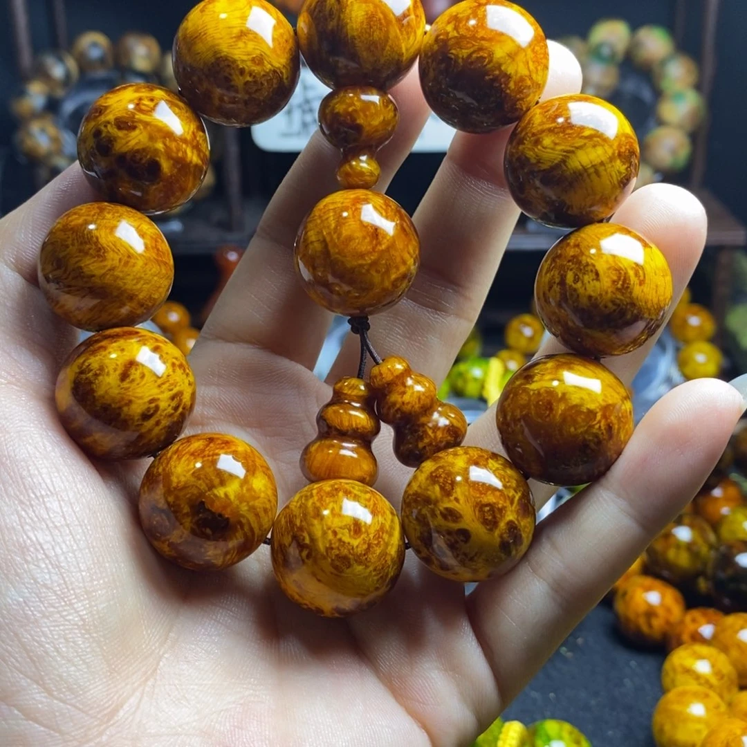 飞****木质非金属琥珀木2.0尺寸精品金丝黄留疤