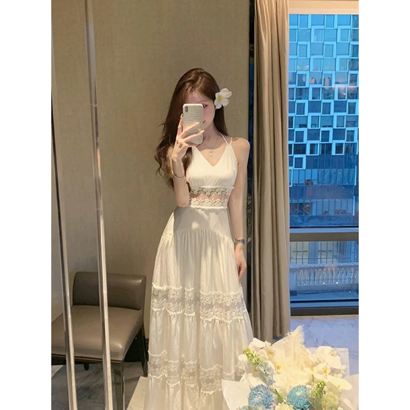 温柔风白色蕾丝拼接连衣裙女夏季新款高级感小众气质吊带度假长裙