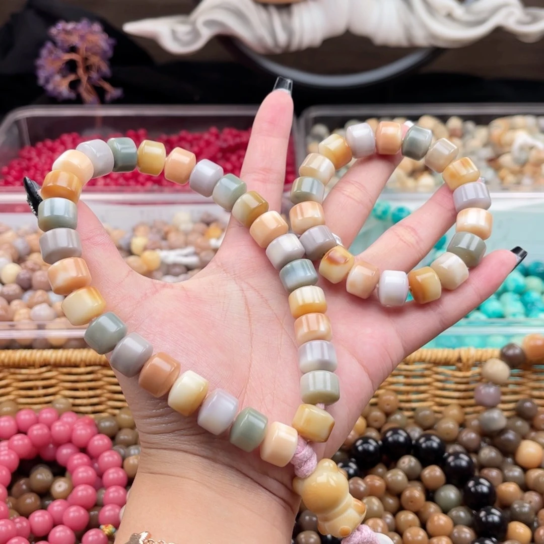 白玉菩提吊坠a13.75mm30颗。花皮干磨大金轮