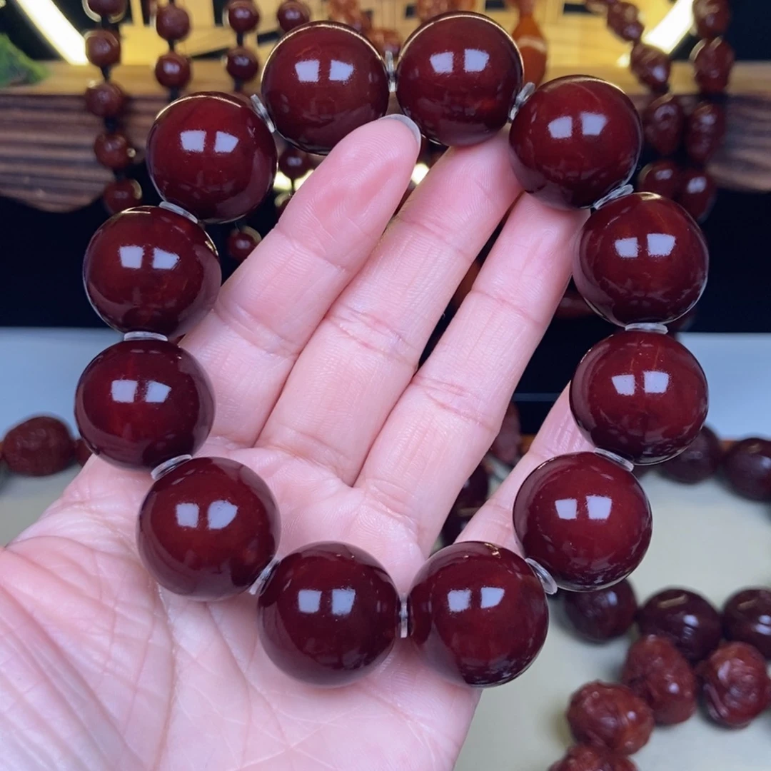 橄榄核吊坠阿****?正圆光珠