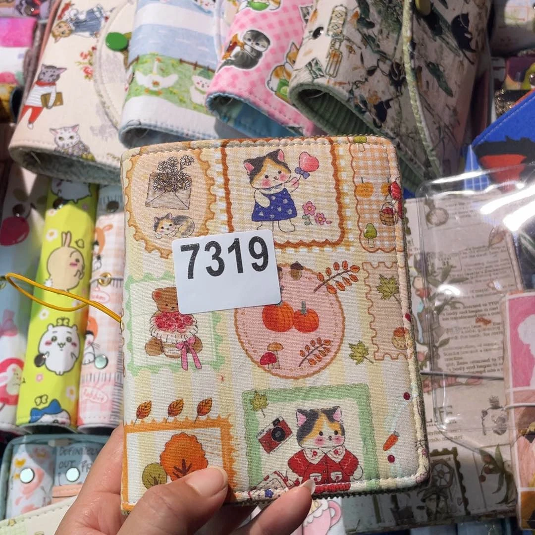 天***猪织绣A7活页加空白纸7319。