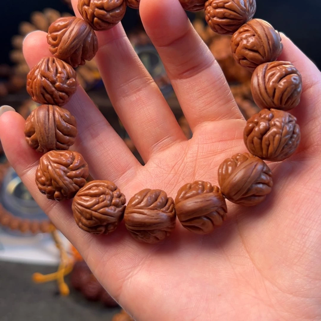 【闪购商品】桃核吊坠18野生豹子头