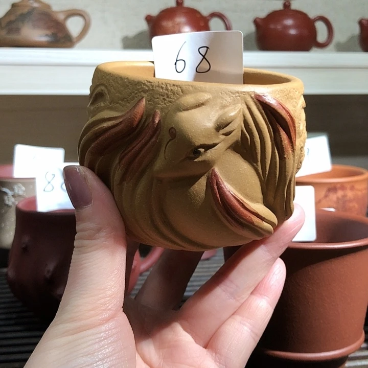 泥塑宜兴原矿紫砂杯。
