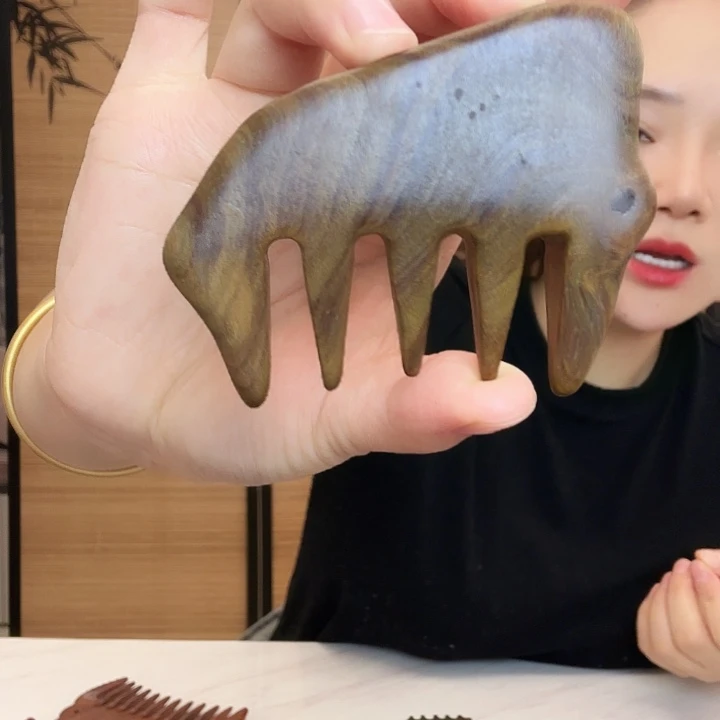绿檀木理疗梳子瑕疵
