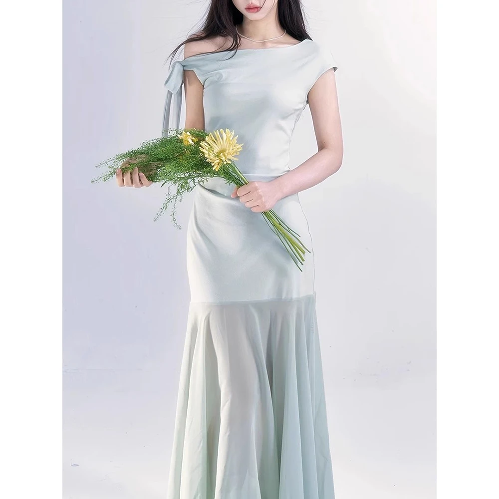 一颗小野莓斜肩收腰网纱连衣裙女夏季高级感气质显瘦露肩长裙