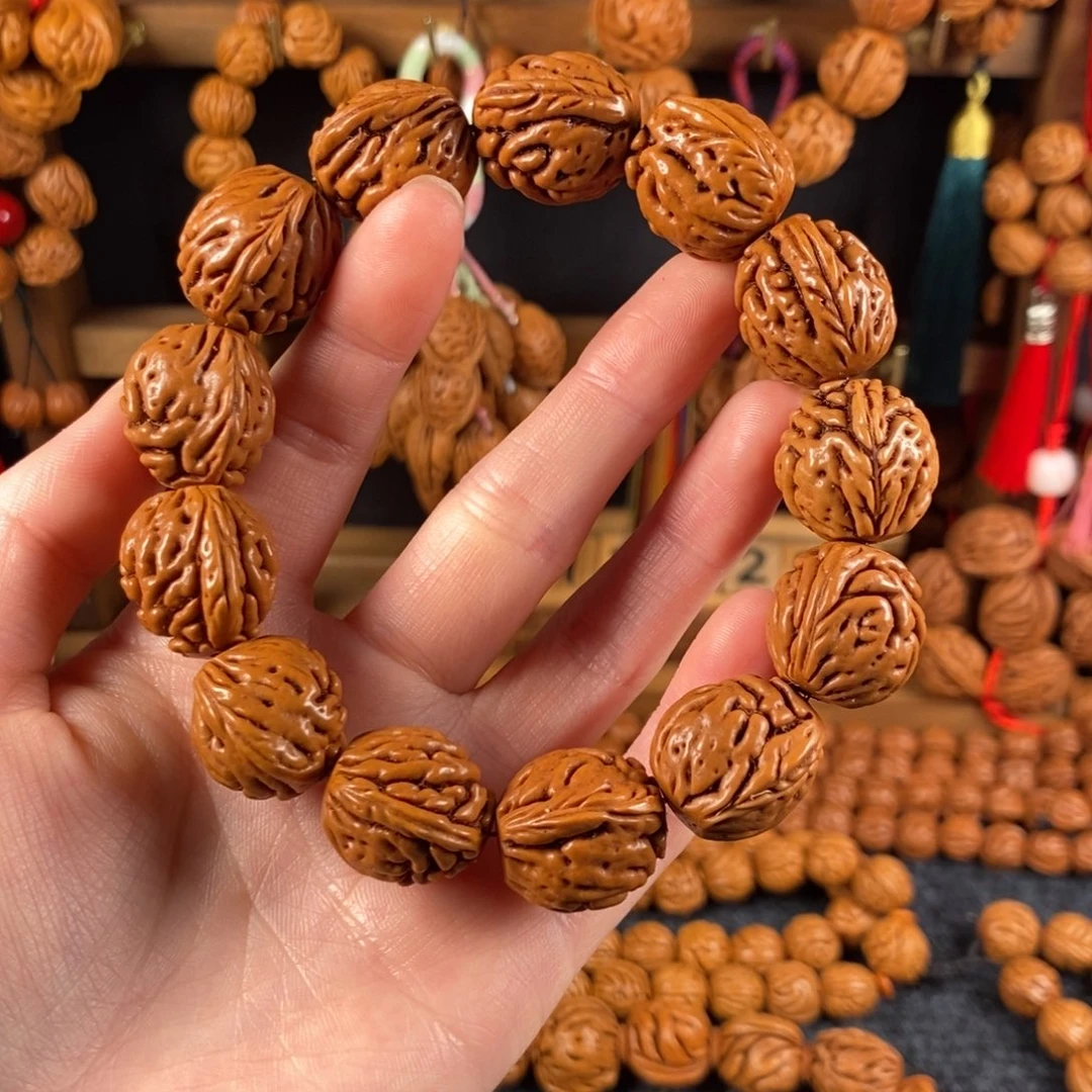 吊坠桃核桃枭手串