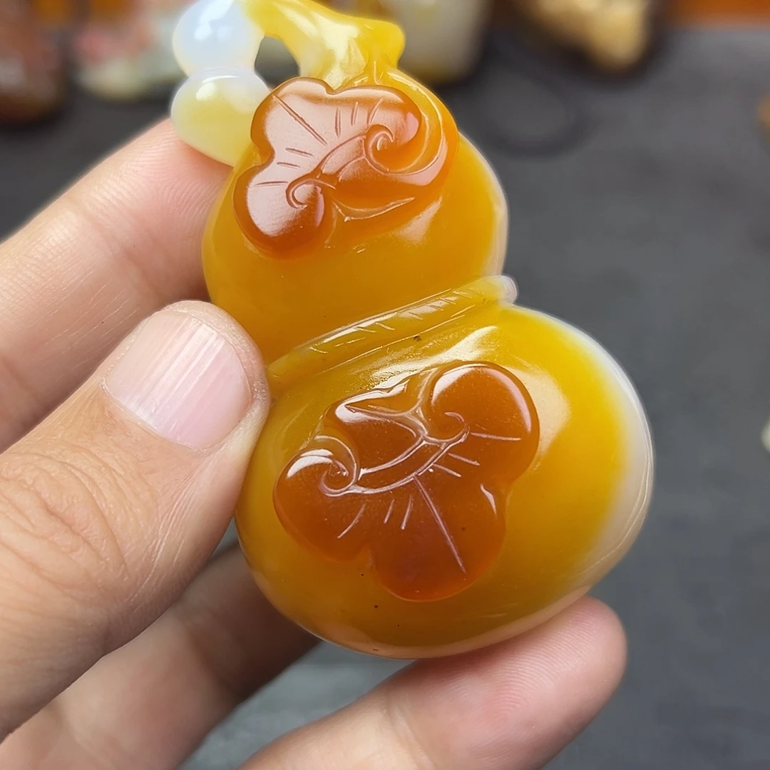 伯***哥玛瑙/玉髓未镶嵌时尚潮流手把件吊坠