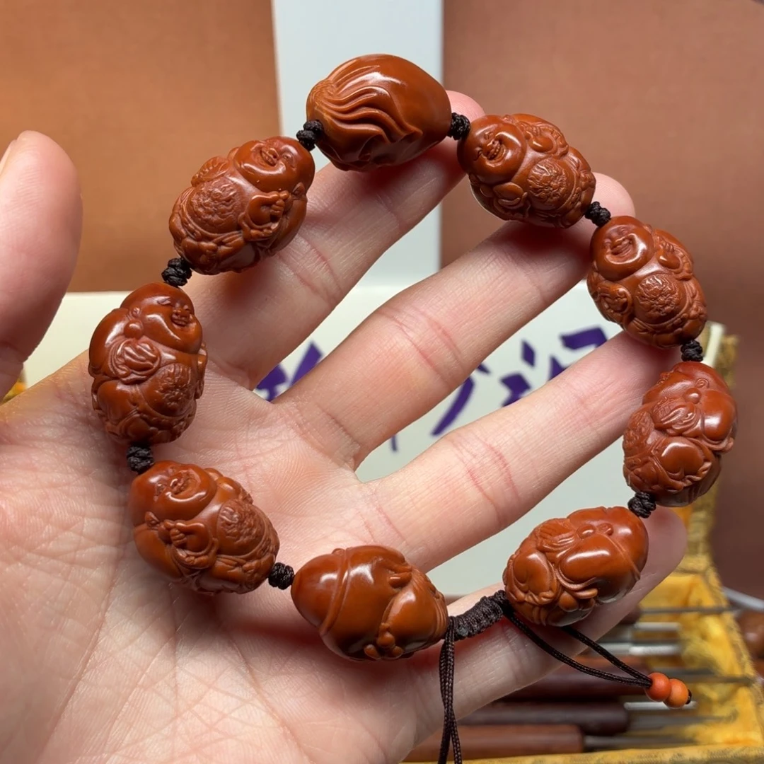 橄榄核手串红八宝弥勒