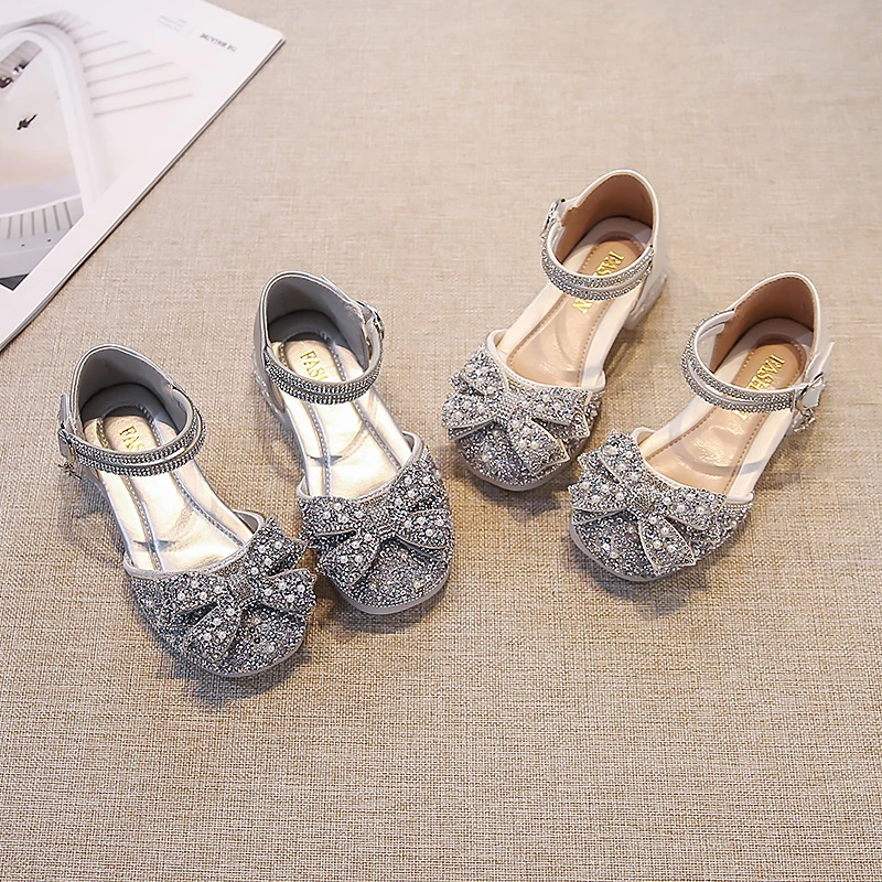 曙尼豪女童公主高跟水晶鞋2025新款小女孩蝴蝶结水钻软底洋气凉鞋