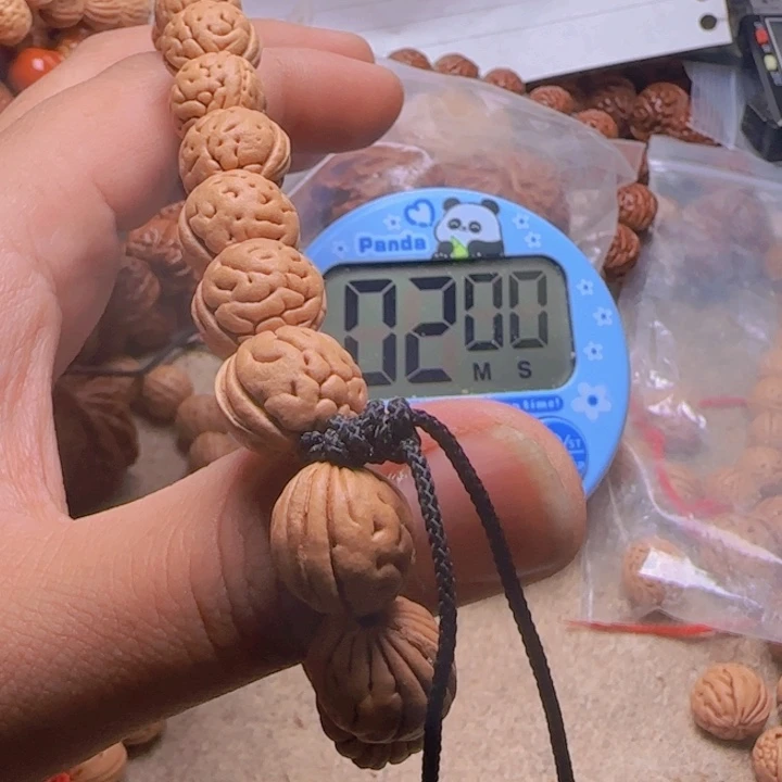 王**.拍210野生桃核大肠纹手持一条